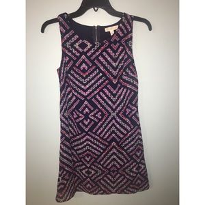 Crisscrossing purple dress
